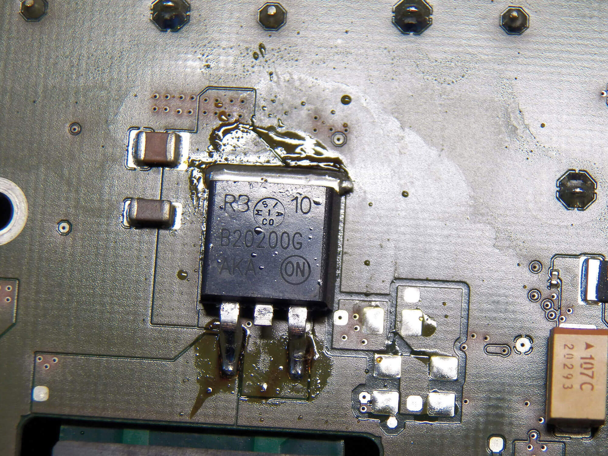 Soldering joint, that has not been cleaned, is damaging the surface of the circuit board – failure is imminent!